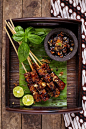 Tempeh skewers (sate tempe), Indonesian - tempeh is fermented soy in a cake form, usually sliced thinly and served with spicy sweet sauce, considered as healthy traditional food in the country