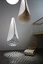 Interesting... large scaled lights, creating pattern shadows: 