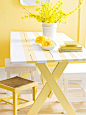 Dress a plain wooden picnic table in bright, sunny stripes. Prime, then base-coat paint the table in your desired color. When dry, measure and tape off stripes with painter's tape. You don't have to stick to the straight and narrow. Once you've determined