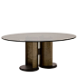 Circle Table  by Giorgetti —  | ECC : A series of round tables of 140 and 160 cm diameter, with the base frame available in two versions: in metal with resin and liquid metal in bronze and gold colour or in metal painted in a bronze colour. The top is in 