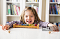 Portrait of happy little girl with xylophones