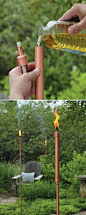 DIY Tiki Torches • Lots of Ideas and Tutorials! Including from 'my home my style', these sleek, modern looking Copper Patio Torches.
