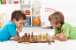 Kids playing chess