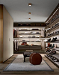 Ubik walk-in closet with wall mounted panels in latte mat lacquered Skin…