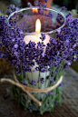 Beautiful purple! / lavender tied with twine around a votive / candle holer +: 