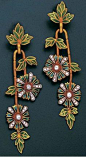 A pair of plique-à-jour enamel and diamond earrings, by Masriera, circa 1950 Each leaf-shaped green plique-à-jour enamel surmount, suspending a textured branch, with brilliant-cut diamond and plique-à-jour enamel flowerheads