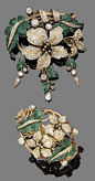 A diamond and enamel brooch and bracelet suite, circa 1860. The brooch designed as a foliate spray set throughout with cushion-shaped and old brilliant-cut diamonds, amongst green guilloché enamel leaves, suspending three cushion-shaped diamond and guillo