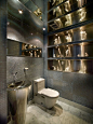 Contemporary gray tile and mosaic tile powder room idea in New York with gray walls