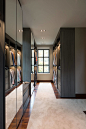 Inspiration for a huge contemporary men's carpeted and beige floor walk-in closet remodel in DC Metro with flat-panel cabinets and gray cabinets