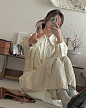Photo by 쿼니 on April 17, 2023. May be an image of 1 person, sleepwear, bath robe and robe.