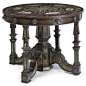 A rare spanish ebony veneered, fruitwood, engraved ivory and mother-of-pearl center table celebrating the reign of Alfonso XIImost probably Madrid ca 1885