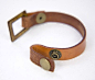 Simple leather cuff. Neat closure idea
