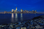 Lower Manhattan cityscape at night from New Jersey