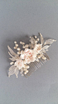 This beautiful handmade bridal hair comb made with freshwater pearls,blush handcrafted flowers, clear crystals and tiny silver leaves. Complement most wedding hairstyles. It is the perfect bridal headpiece for that woman who wants to simply sparkle on her