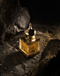 Photo by AMOUAGE on November 18, 2023. May be an image of fragrance, lantern, perfume and lightbulb.