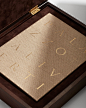 This may contain: the inside of a wooden box with writing on it