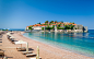 Sveti Stefan luxury sand beach with chaise-longue chairs and umbrellas by Alexander Nikiforov on 500px