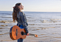 Young woman playing guitar outdoor by Oleg Evseev on 500px