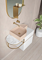 Rectilinear and curvilinear converge in asymmetrical basins, fabricated from LivingTec solid surfacing, in such new colors as Rosa Cipria. Countless configurations incorporate stone or marble surfaces. Finish options for the ash and oak cabinets include v