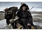 Chasseur d'aigle
Photograph by Simon Morris (Bridgend, United Kingdom). FINALIST: People
An eagle hunter on a steppe in Mongolia rests with his Golden Eagle. (Mongolia, February 2013, Nikon D700)

