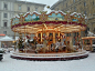 carousel with snow falling