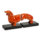 Imax - Henry Dog Bookends, Set of 2 - In a rich poppy orange shade, the Henry dog bookends enliven bookshelves or reading areas with a pop of bold color and unexpected charm.