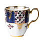 The 1900 Regency Blue Mug is decorated in regal blue with delicate stylized maroon floral themes and delicate gold accents.