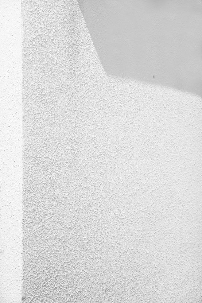 white concrete wall_...