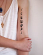 This temporary moon phase tattoo is so cool.