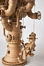 Sci-Fi Inspired Cardboard Sculptures by Greg Olijnyk Feature Fully Articulated Limbs and Working Motors : To balance out his working life as a graphic designer focused on 2-D digital projects, Greg Olijnyk creates cardboard sculptures  in his free time. T