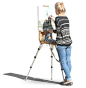 Young female artist painting: 