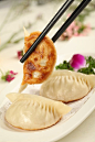 饺子,小吃,饮食,健康食物,盘子_27fa6be3d_锅贴_创意图片_Getty Images China
