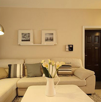 现代简约风格跃层三室一厅客厅沙发装修效果...