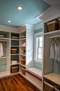 Closet. Walk-in Closet Ideas. A cozy window seat separates custom-built closet units and offers a comfortable place to rest while getting ready. Paint Color is “Sherwin Williams 6478 Watery”. #Closet: 