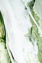 绿色液体大理石背景抽象流动纹理实验艺术 