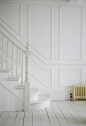 Wall paneling and wooden staircase: Remodelista: 