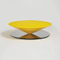 Float Coffee Table – Yellow Float is a sculptural coffee table that challenges senses and perception. The geometrical design is softened by refined details such as the bezelled lip on the edges of the perfect circle of the cone. A massive metal cone appar