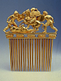 Gold comb with Scythians in battle, 5th-4th centuries BC. This comb recalls the facade of a Greek temple with a colonnade made up of its 12 teeth, a triangular fronton with three battling warriors, and a frieze of five reclining lions. Excavated in 1913 a