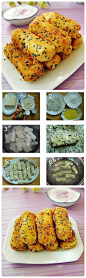 【美味点心之——炸金条】 原料：豆腐配料：面包糠 鸡蛋 黑芝麻 淀粉 酸奶 蓝莓酱 1，原料 2，面包糠黑芝麻混合拌匀，鸡蛋三个，一个全蛋，两个用黄去蛋清，充分搅拌均匀。（这样炸出的金条比较黄，要是自己家吃，就别这么浪费，都用吧，两个鸡蛋就够了） 3，豆腐切条焯水一下，去豆腐的涩味。捞出（要小心，别碰碎了） 4，依次沾生粉，蛋液，面包糠... 5，做好生坯 6，中火炸金黄即可。蓝莓和酸奶混合，吃的时候蘸