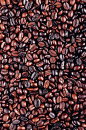 深棕色咖啡可可豆背景图