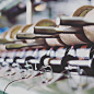 Craftsmanship | Spinning & Winding - During the spinning process fibres are twisted together, in a variety of ply options, to give them strength and elasticity. Following this, the yarn is carefully checked as it is wound from bobbins onto yarn cones 