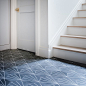 Black Cement Tiles with Light Blue Paneled Doors