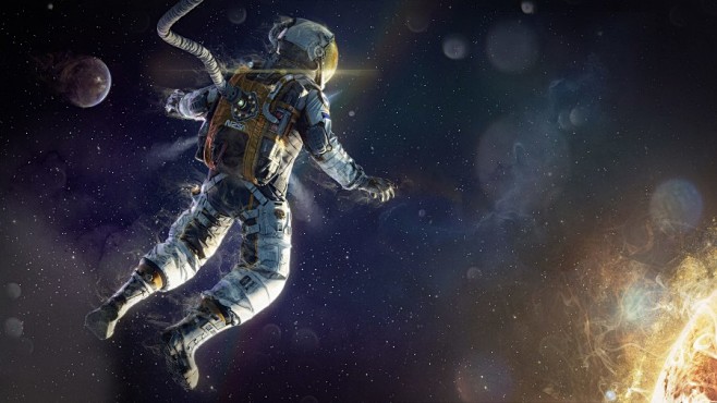 太空中游走的宇航员图片