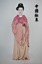 北魏-襦裙
红色绢地印花衣，浅色纱裙，
紫地缋画纱巾，对羊对鸟树纹锦腰带