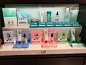 the shelf is filled with different types of skin care products