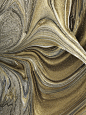 Gold and silver marbled paint pattern