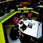 Students from Huntsville City (Ala.) Schools study in the cyber cafe, formerly the library, as part of a districtwide shift to digital learning in partnership with Pearson. This overhaul  boosted enrollment and has shown marked improvement in student enga