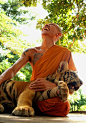 Monk with tiger