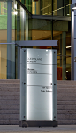 Queensland Museum : Our brief was to modernise the existing Cultural Centre signage, that we had previously developed in the early 1990s, by referencing the materials and colours used in the new Museum entry.
