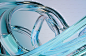 a close up of a blue glass object